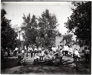 Children Playing on Seesaws in a Park